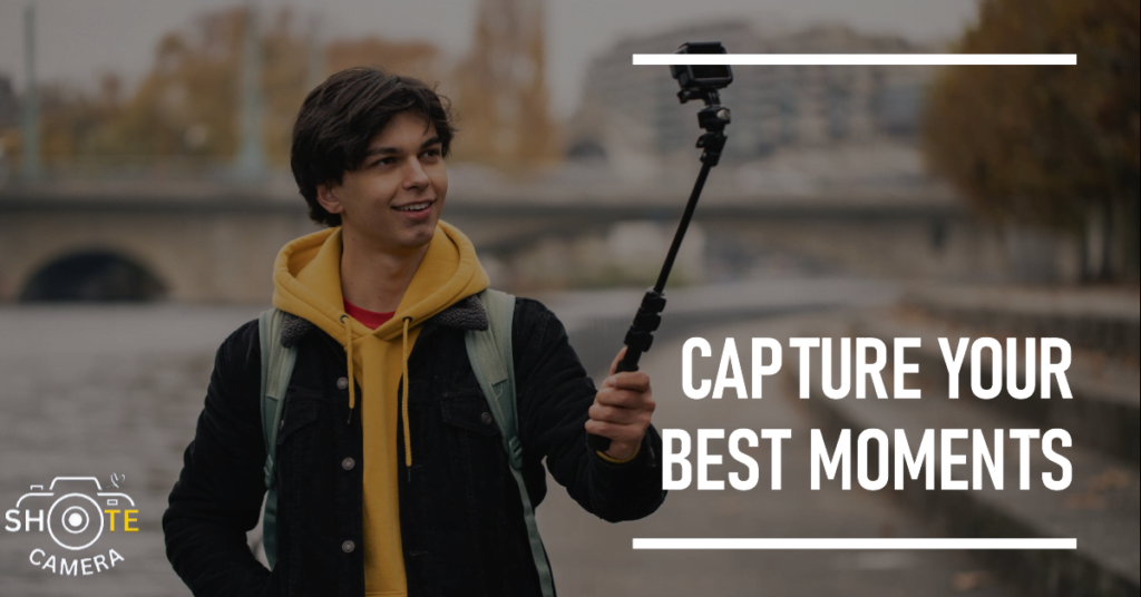 Best Selfie Sticks: Capture Your Memories with Ease 2 A person with a pixelated face is holding a selfie stick with a camera attached, standing in front of a blurred background featuring trees and a bridge over water. The image has the text ‘CAPTURE YOUR BEST MOMENTS’ overlaid at the bottom, along with the logo ‘SHOTe CAMERA’ in the lower left corner.