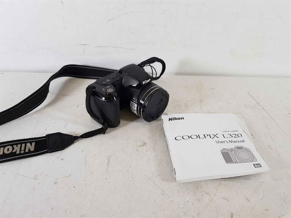 Coolpix 320: A Compact Marvel in Photography 2 Coolpix 320